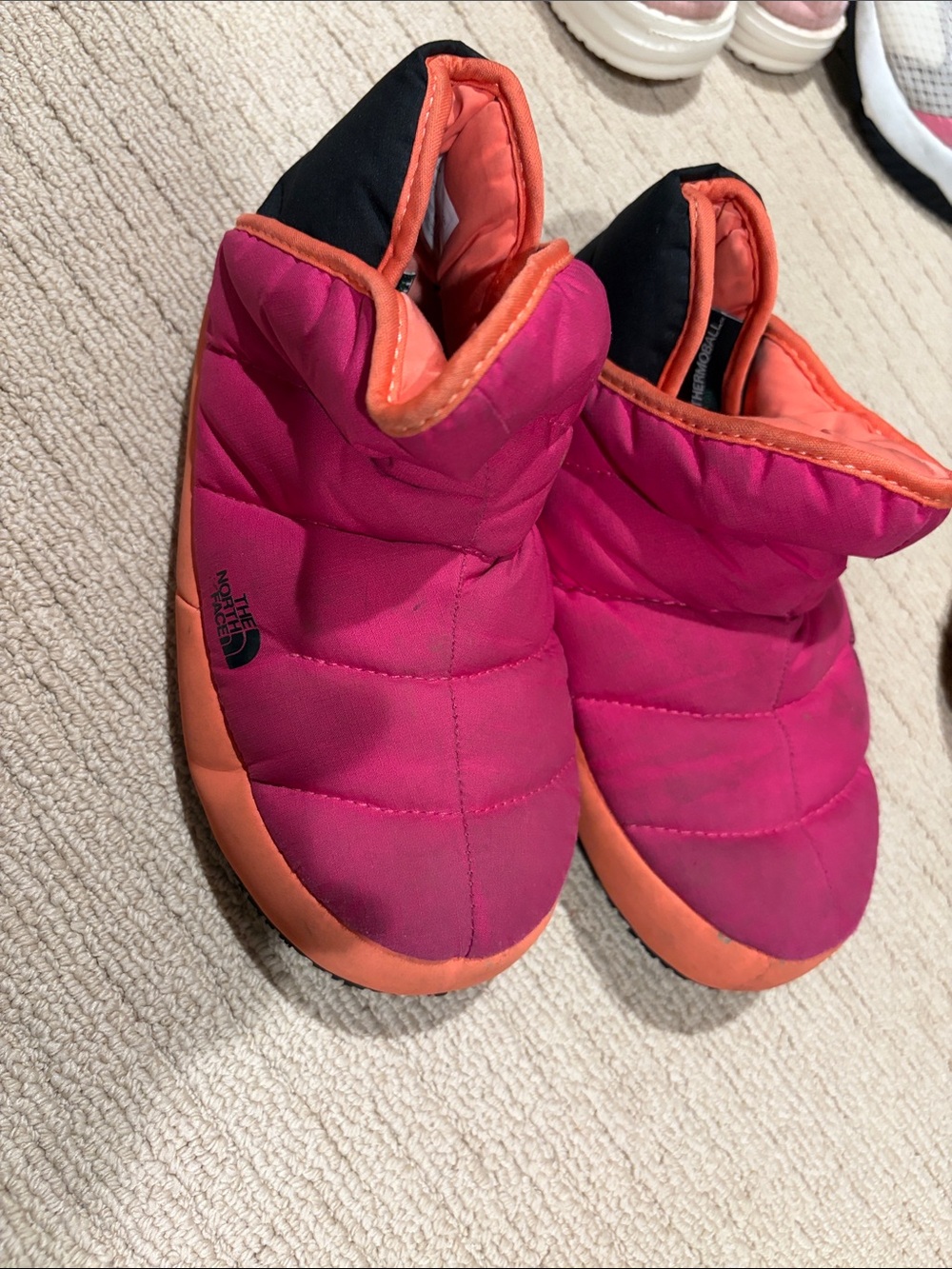 The North Face Kids Pink and Orange Puffy Slip-On Slippers